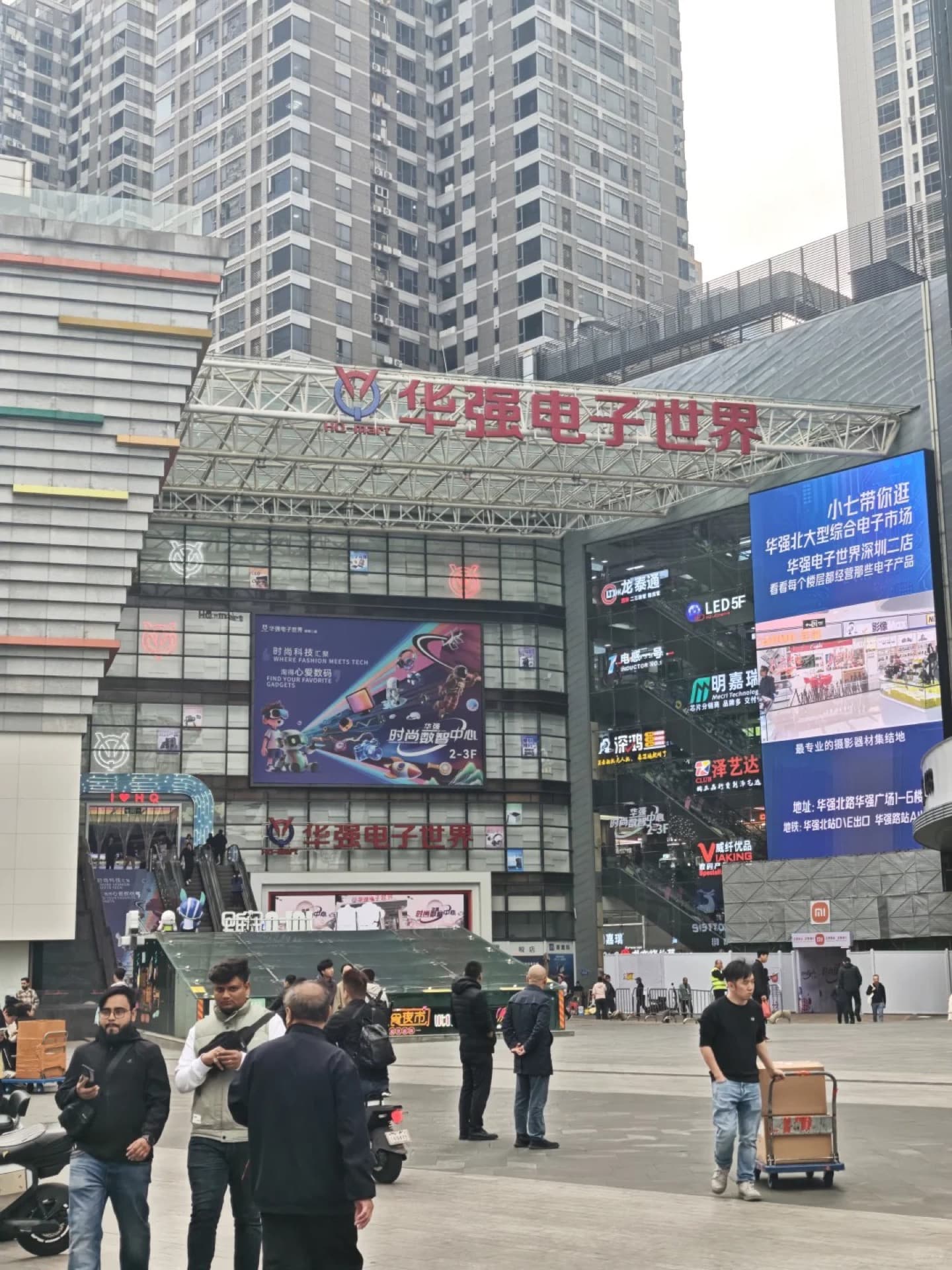 Bustling electronics stalls inside a Huaqiangbei multi-floor market tower in Shenzhen